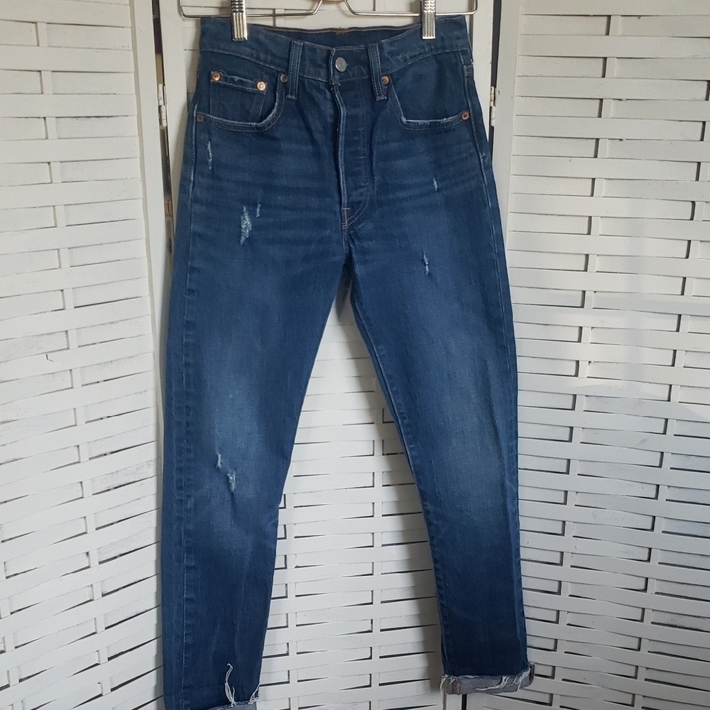 501 Levis Fly Button Blue Women's. Jeans distress size 24